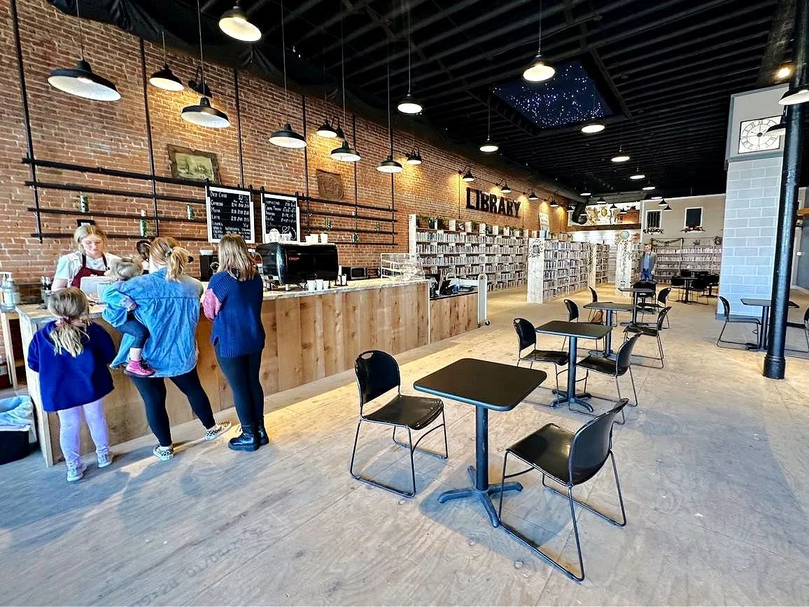 New coffee shop + library + license office creates community hub